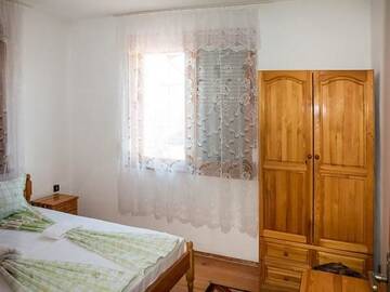 Фото номера Дом с 5 спальнями Дома для отпуска Velibash House г. Велика 39